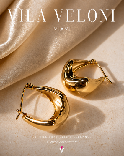 Gold hoop earrings with fluid elegance