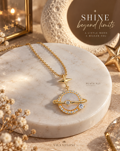 Elegant star and planet necklace in 925 silver with 18-karat gold plating and cubic zirconia.