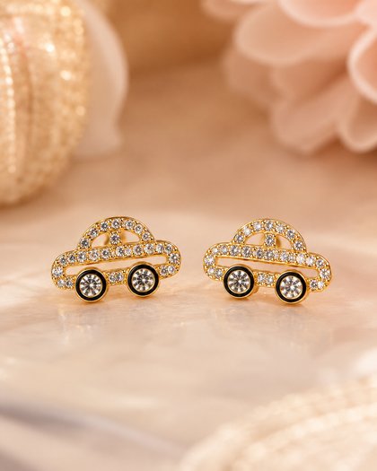 Car-shaped earrings in 925 silver with 18k gold plating.