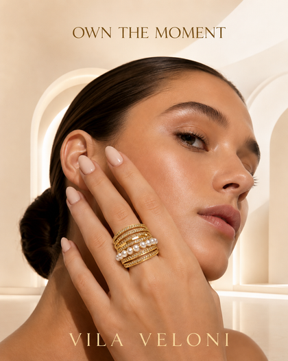 Brass and 18k gold-plated ring with cubic zirconia and pearls.