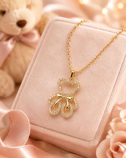 Necklace with bear pendant and cubic zirconias accompanied by a bow in 925 Silver with 18k Gold Plating