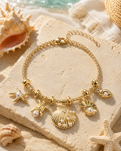 Sea Treasures Bracelet - starfish & turtle charms, gold-tone, adjustable